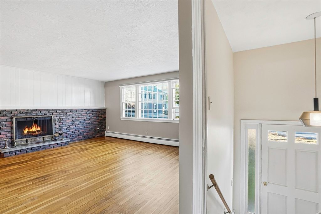 Empty room, Fireplace, Interior, Pendant Lights, Wood Texture Flooring