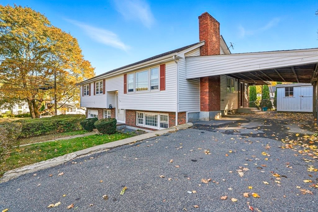 Backyard, Exterior, Facade, Brick Facade, Raised Ranch