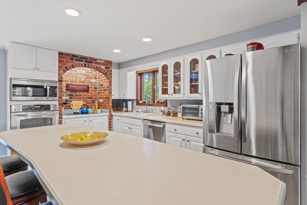 Interior, Kitchen, Recessed Lighting, Stainless Steel Appliances, Stone Walls