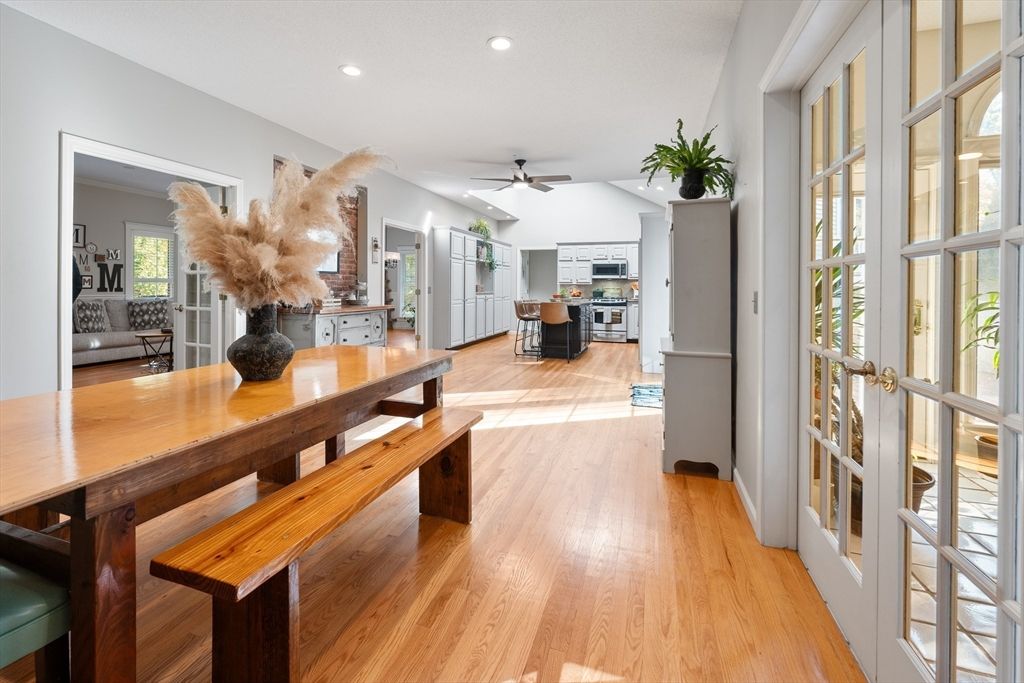 Dining room, Interior, Kitchen, Recessed Lighting, Stainless Steel Appliances, Wood Texture Flooring