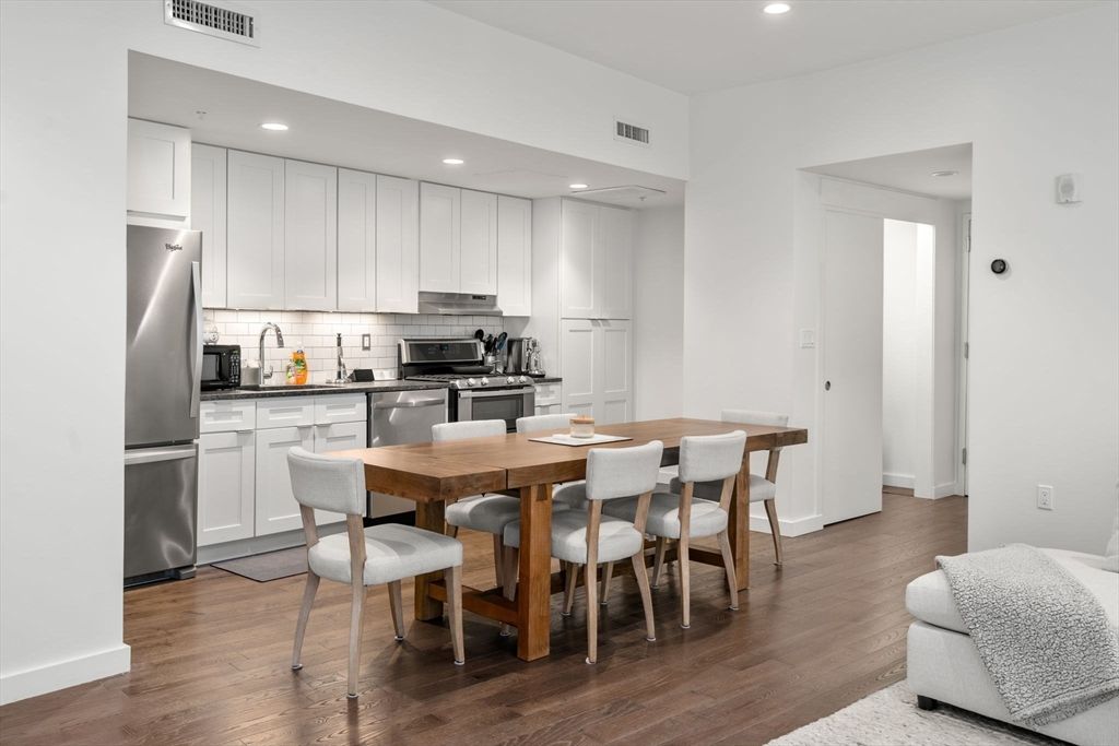 Dining room, Interior, Kitchen, Recessed Lighting, Stainless Steel Appliances, Wood Texture Flooring