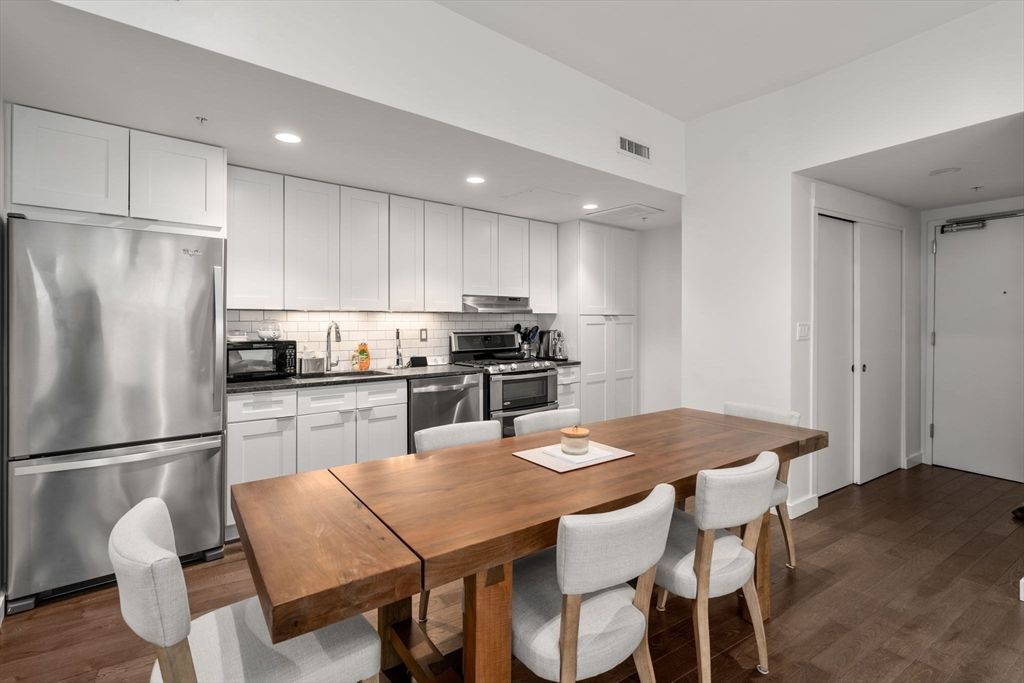 Dining room, Interior, Kitchen, Recessed Lighting, Stainless Steel Appliances, Wood Texture Flooring