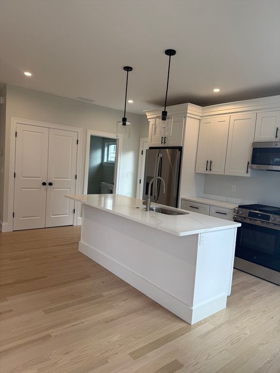 Interior, Kitchen, Pendant Lights, Recessed Lighting, Stainless Steel Appliances, Wood Texture Flooring