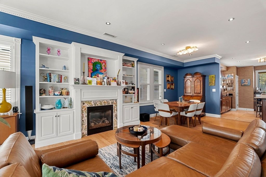 Dining room, Fireplace, Interior, Living room, Recessed Lighting, Wood Texture Flooring