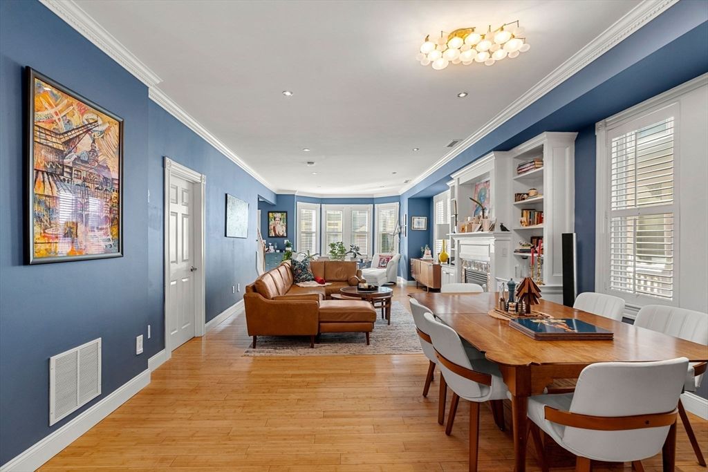 Dining room, Fireplace, Interior, Living room, Recessed Lighting, Wood Texture Flooring