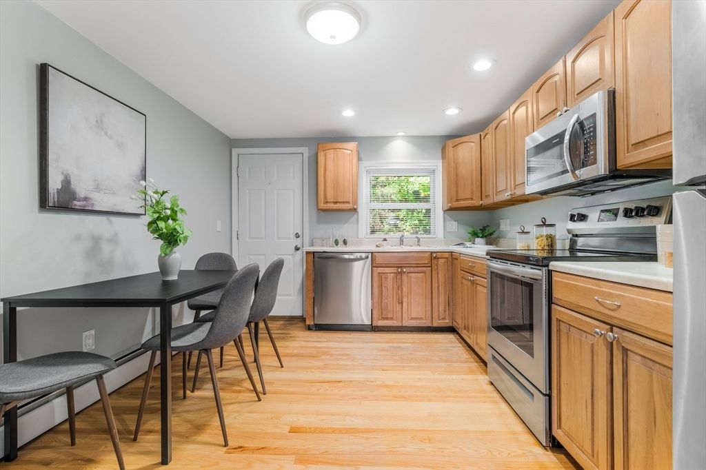 Dining room, Interior, Kitchen, Recessed Lighting, Stainless Steel Appliances, Wood Texture Flooring