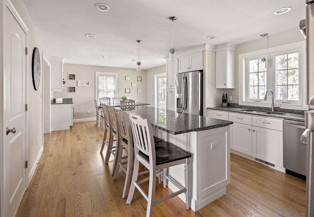 Dining room, Interior, Kitchen, Pendant Lights, Recessed Lighting, Stainless Steel Appliances, Wood Texture Flooring