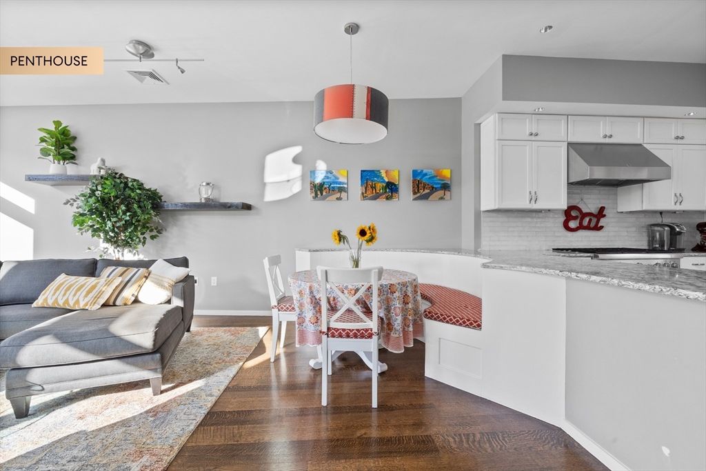 Dining room, Interior, Kitchen, Pendant Lights, Recessed Lighting, Stainless Steel Appliances, Wood Texture Flooring