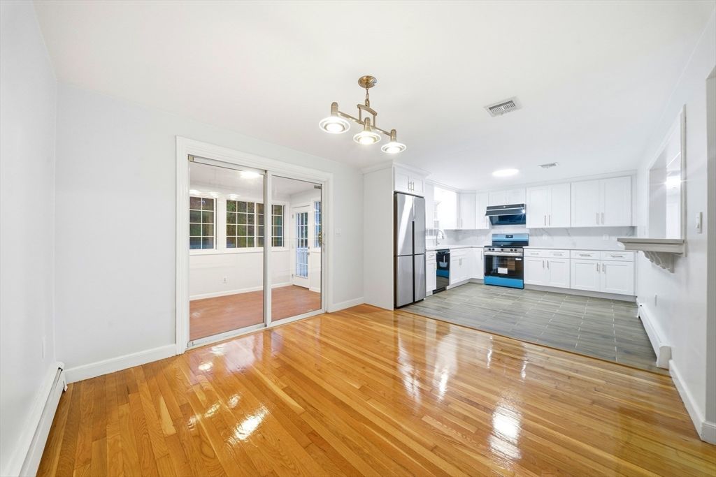 Empty room, Interior, Kitchen, Stainless Steel Appliances, Wood Texture Flooring