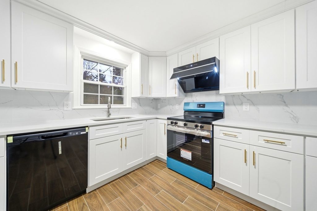 Interior, Kitchen, Marble Walls, Stainless Steel Appliances, Wood Texture Flooring