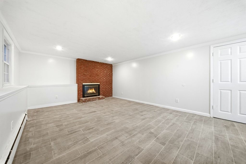 Empty room, Fireplace, Interior, Recessed Lighting, Wood Texture Flooring