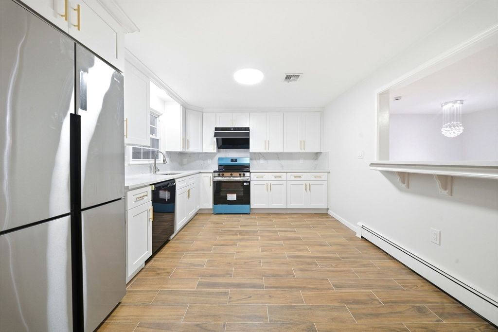 Chandelier, Interior, Kitchen, Recessed Lighting, Stainless Steel Appliances, Wood Texture Flooring