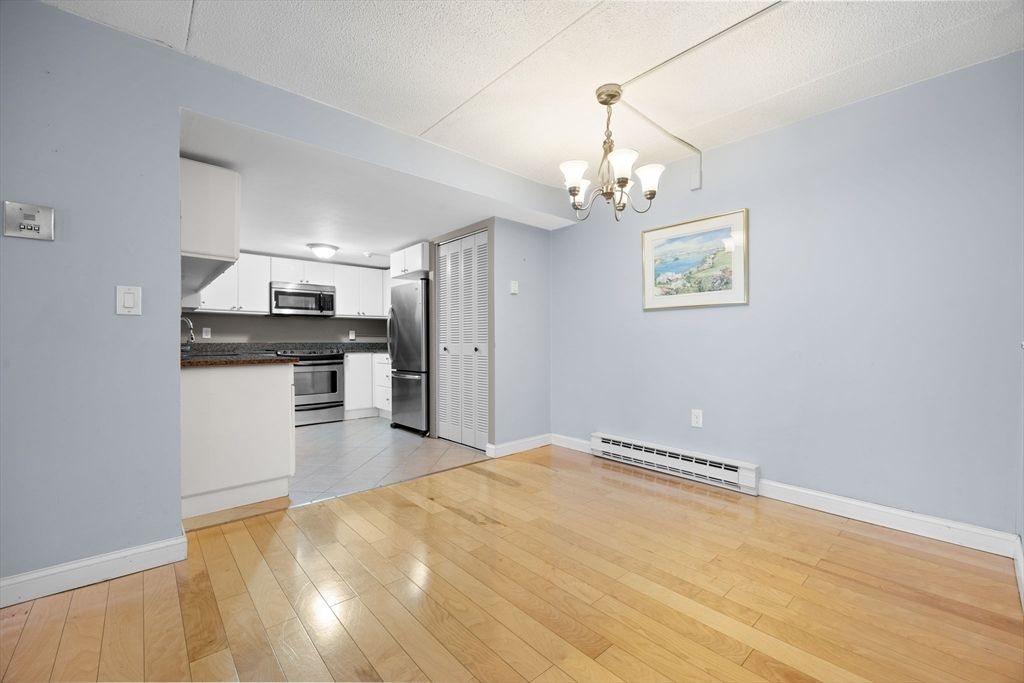 Chandelier, Empty room, Interior, Kitchen, Stainless Steel Appliances, Wood Texture Flooring