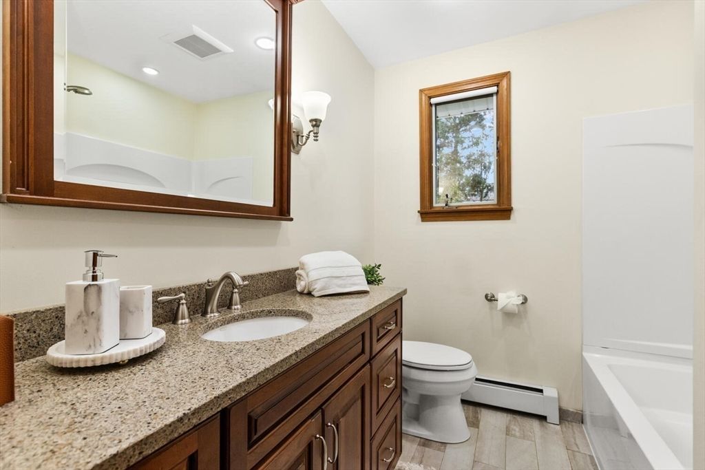 Bathroom, Dual Sink Vanities, Interior, Recessed Lighting, Wood Texture Flooring