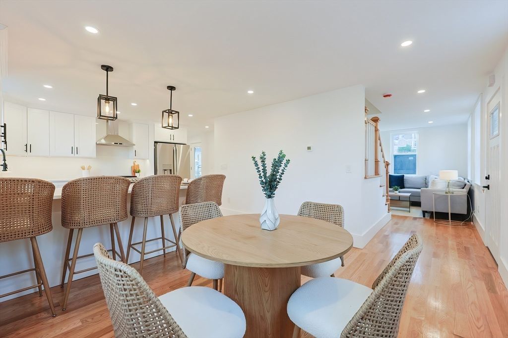 Dining room, Interior, Kitchen, Living room, Pendant Lights, Recessed Lighting, Stainless Steel Appliances, Wood Texture Flooring