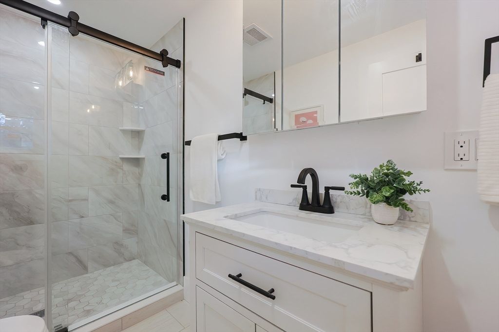 Bathroom, Dual Sink Vanities, Glass Shower, Interior, Marble Walls