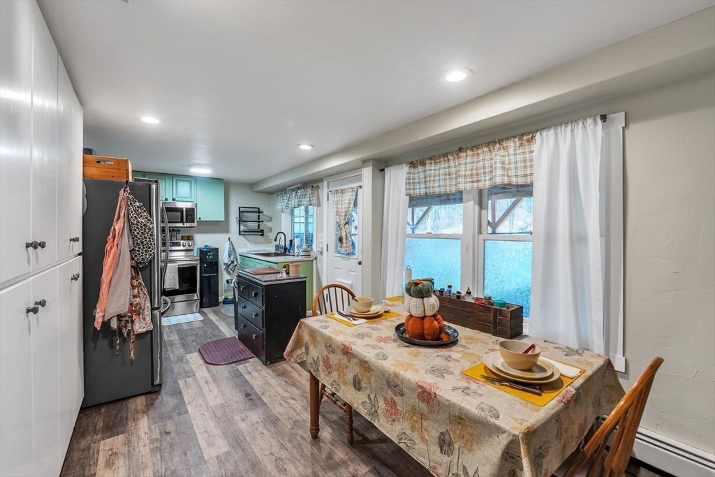 Dining room, Interior, Kitchen, Recessed Lighting, Stainless Steel Appliances, Water, Wood Texture Flooring