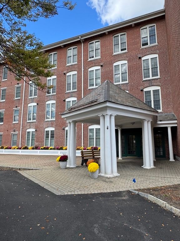 Exterior, Facade, Brick Facade, Condo Building