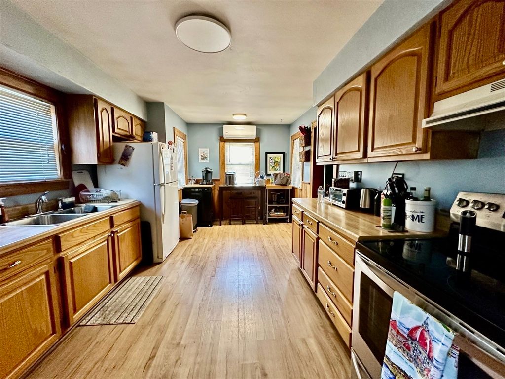 Interior, Kitchen, Tile Countertops, Wood Texture Flooring