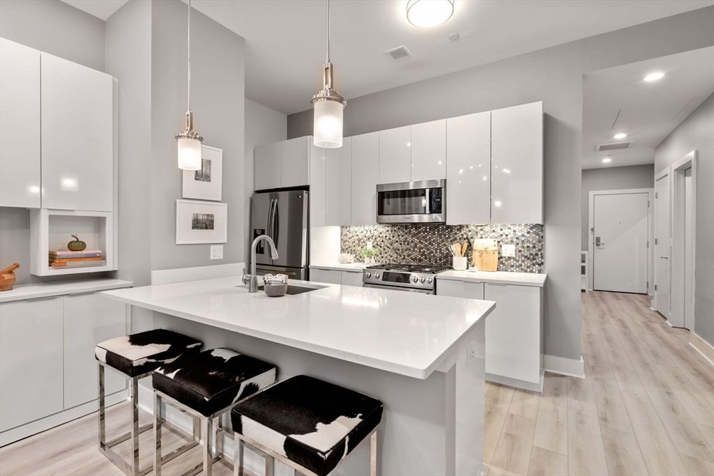 Interior, Kitchen, Pendant Lights, Recessed Lighting, Stainless Steel Appliances, Wood Texture Flooring