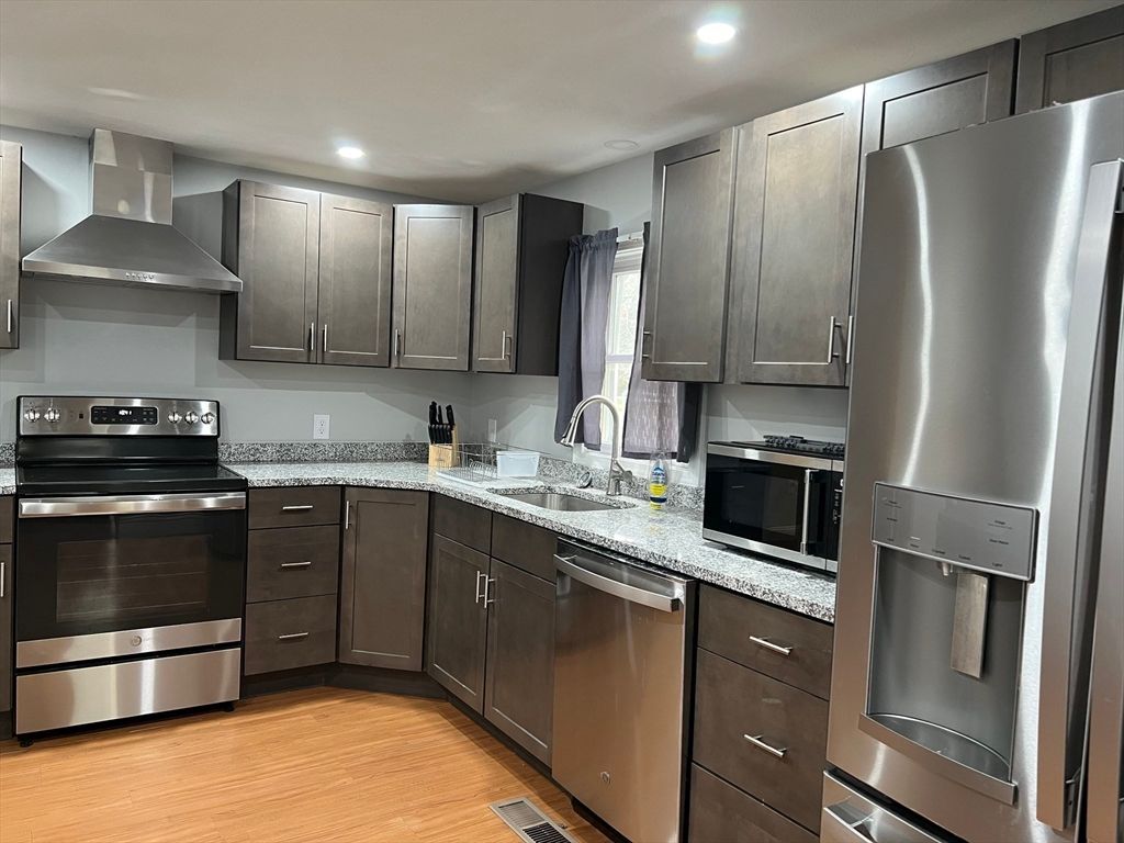 Interior, Kitchen, Recessed Lighting, Stainless Steel Appliances, Wood Texture Flooring