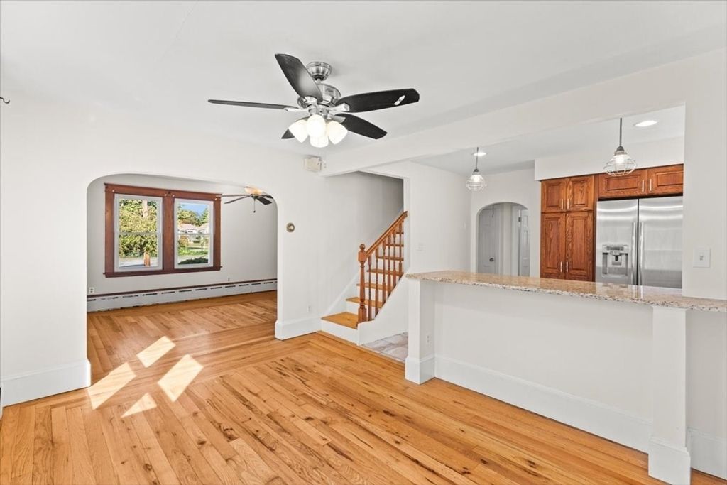 Chandelier, Empty room, Interior, Kitchen, Pendant Lights, Recessed Lighting, Stainless Steel Appliances, Wood Texture Flooring