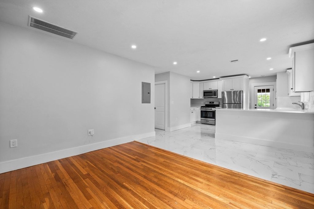 Interior, Kitchen, Marble, Recessed Lighting, Stainless Steel Appliances, Wood Texture Flooring