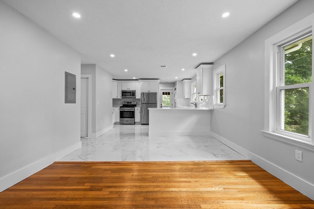 Interior, Kitchen, Marble, Recessed Lighting, Stainless Steel Appliances, Wood Texture Flooring