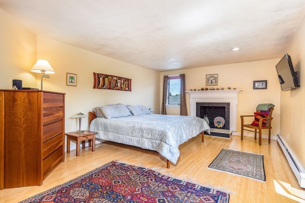 Bedroom, Fireplace, Interior, Recessed Lighting, Wood Texture Flooring