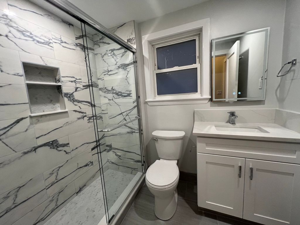 Bathroom, Glass Shower, Interior, Marble Walls, Wood Texture Flooring