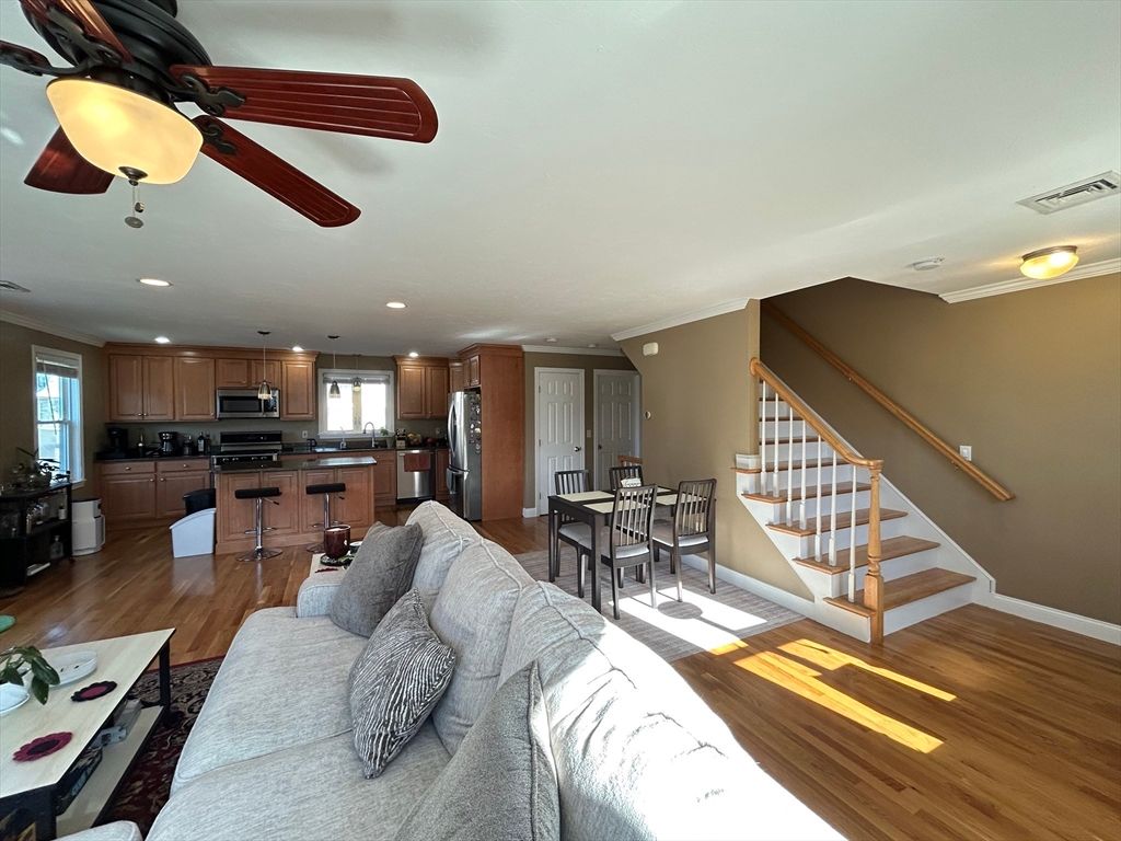 Dining room, Interior, Kitchen, Living room, Recessed Lighting, Stainless Steel Appliances, Wood Texture Flooring