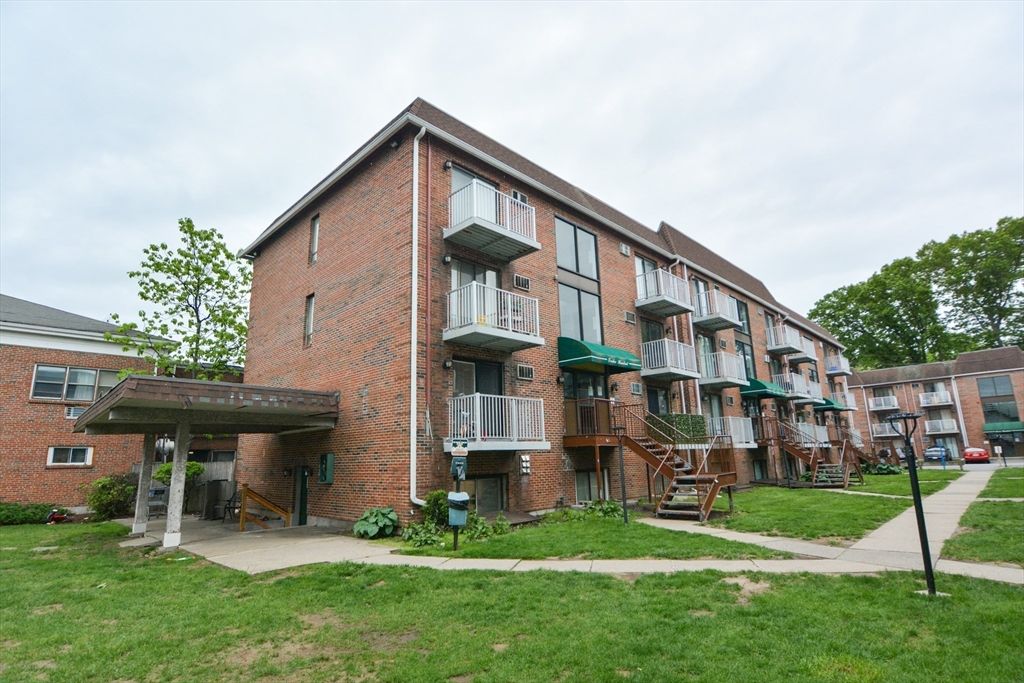 Exterior, Facade, Brick Facade, Condo Building