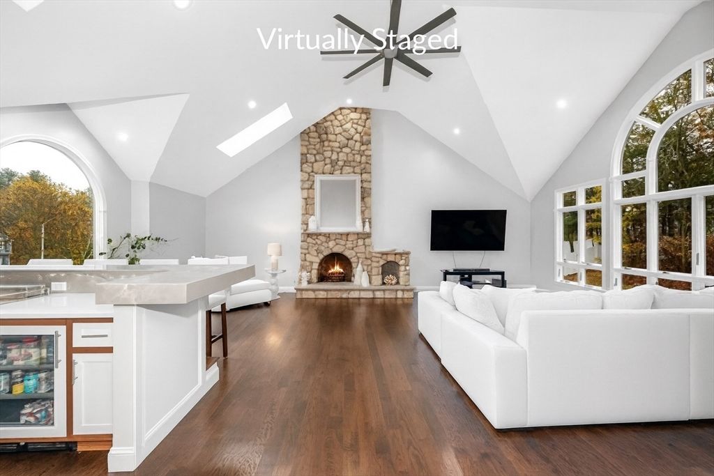 Fireplace, Interior, Living room, Recessed Lighting, Stone Walls, Wood Texture Flooring