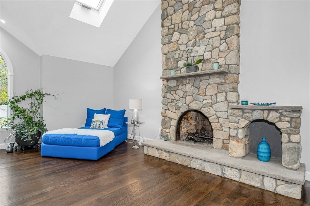 Bedroom, Fireplace, Interior, Recessed Lighting, Stone Walls, Wood Texture Flooring