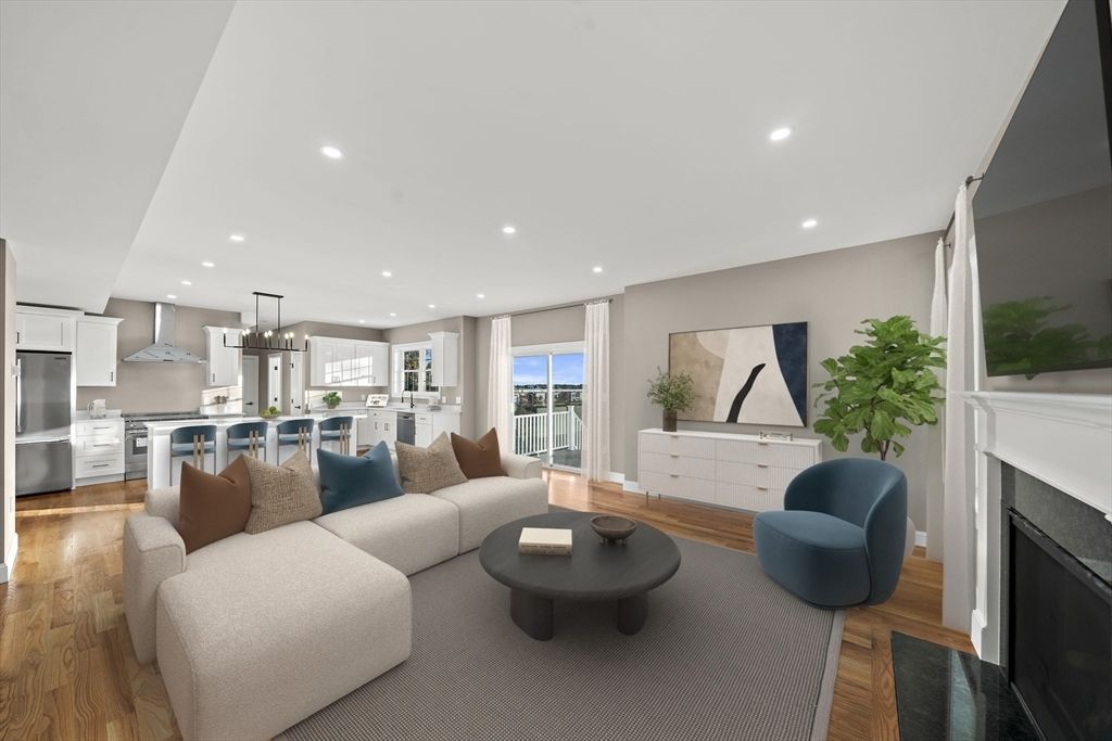 Dining room, Fireplace, Interior, Kitchen, Living room, Pendant Lights, Recessed Lighting, Stainless Steel Appliances, Wood Texture Flooring