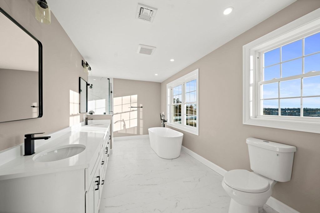 Bathroom, Dual Sink Vanities, Free Standing Baths, Interior, Marble, Recessed Lighting, Water