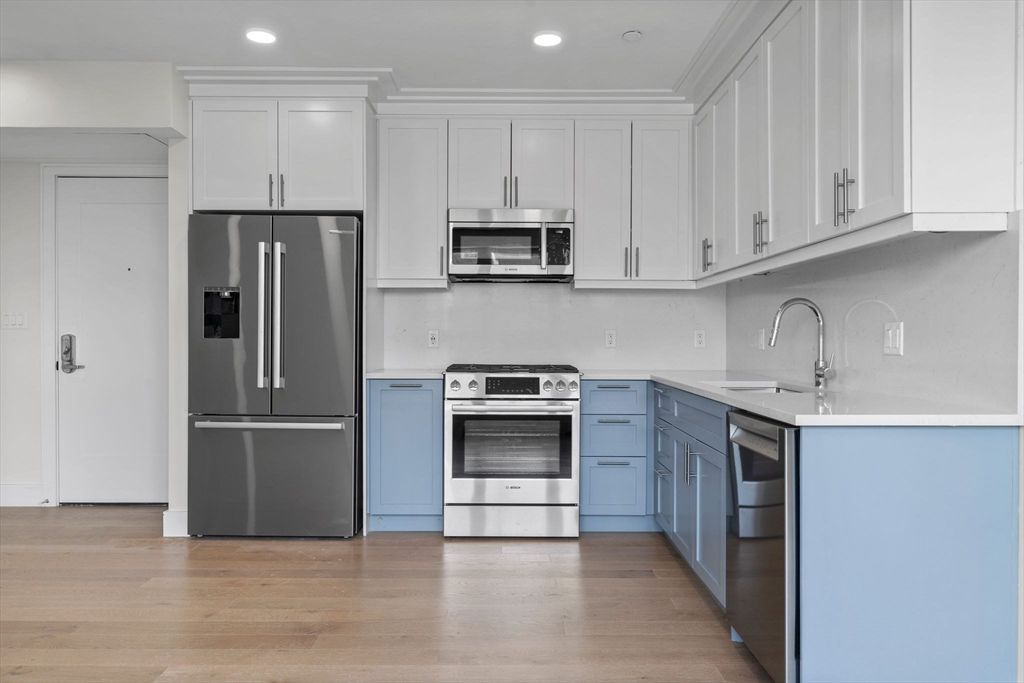 Interior, Kitchen, Recessed Lighting, Stainless Steel Appliances, Wood Texture Flooring