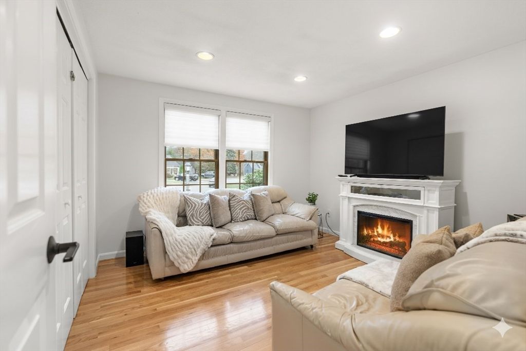 Fireplace, Interior, Living room, Recessed Lighting, Wood Texture Flooring