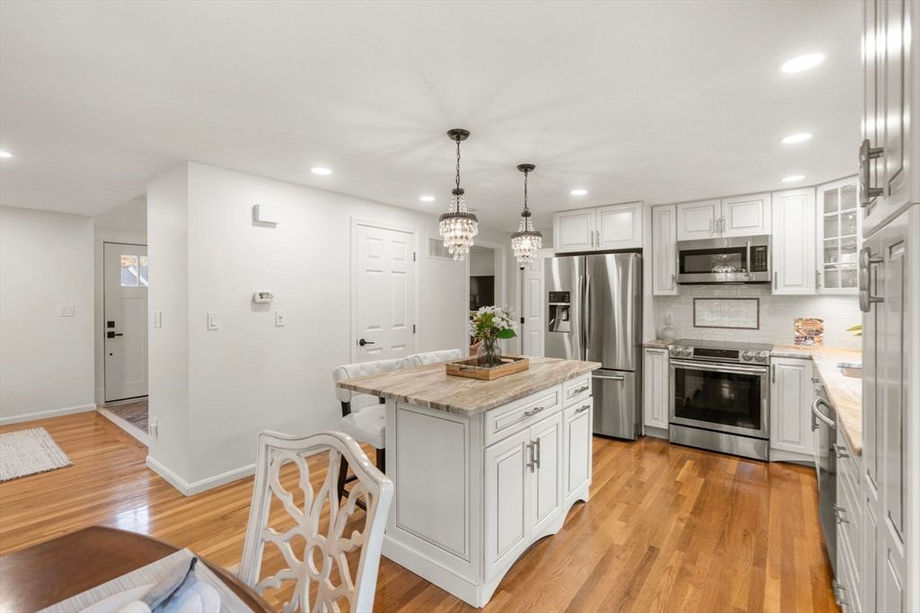Chandelier, Interior, Kitchen, Recessed Lighting, Stainless Steel Appliances, Wood Texture Flooring