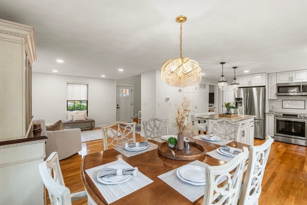 Chandelier, Dining room, Interior, Kitchen, Pendant Lights, Recessed Lighting, Stainless Steel Appliances, Wood Texture Flooring