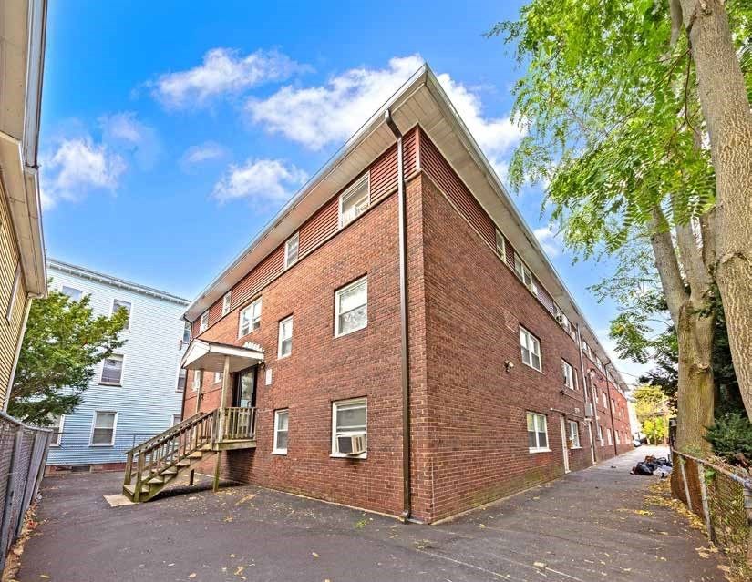 Exterior, Facade, Brick Facade, Condo Building