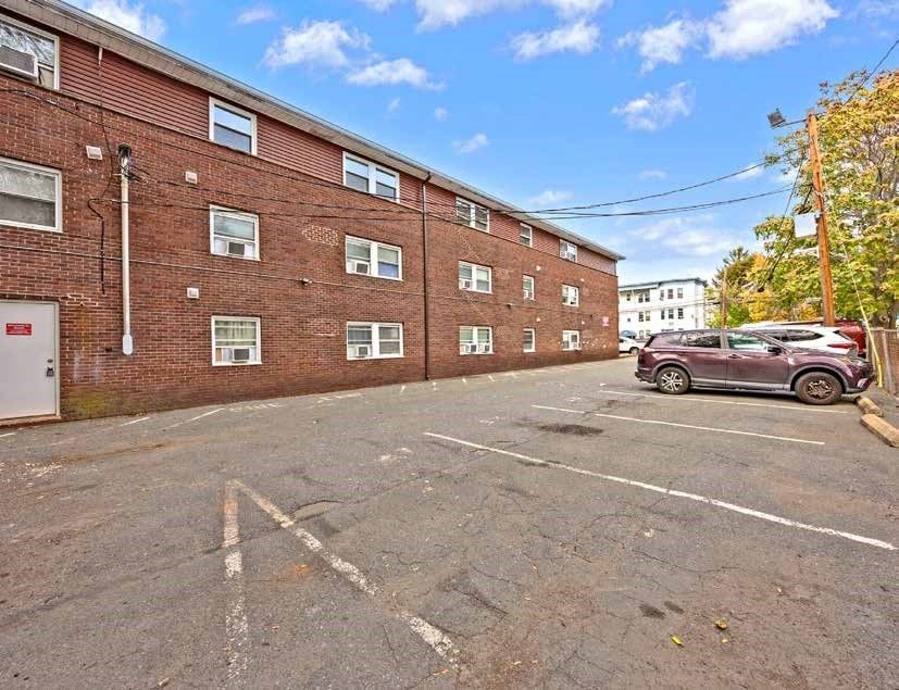 Exterior, Facade, Brick Facade, Condo Building