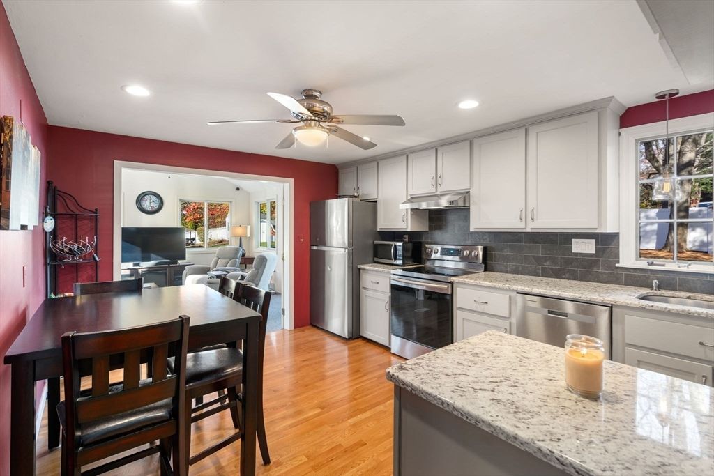 Dining room, Interior, Kitchen, Recessed Lighting, Stainless Steel Appliances, Wood Texture Flooring