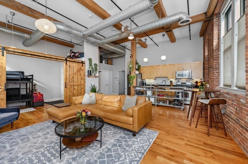 Interior, Kitchen, Living room, Pendant Lights, Stainless Steel Appliances, Stone Walls, Wood Texture Flooring