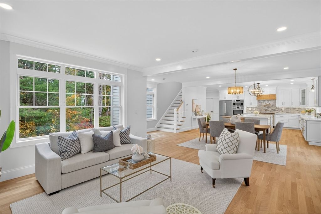 Chandelier, Dining room, Interior, Kitchen, Living room, Pendant Lights, Recessed Lighting, Stainless Steel Appliances, Wood Texture Flooring