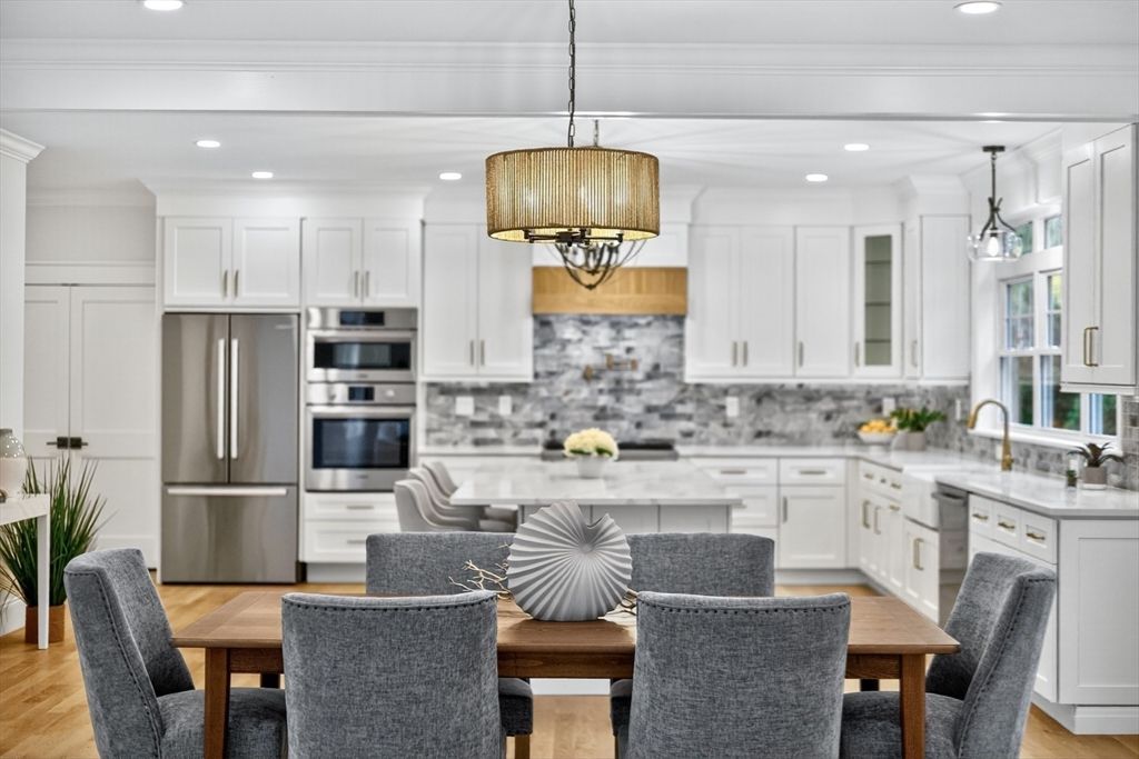 Dining room, Interior, Kitchen, Pendant Lights, Recessed Lighting, Stainless Steel Appliances, Wood Texture Flooring