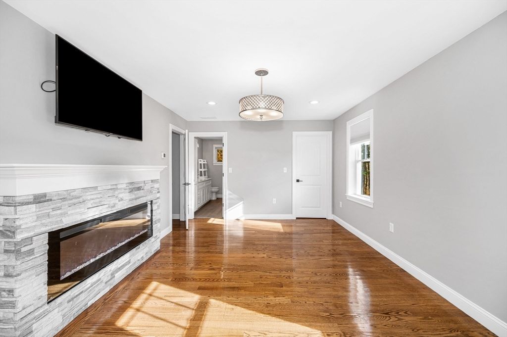 Empty room, Fireplace, Interior, Pendant Lights, Recessed Lighting, Wood Texture Flooring
