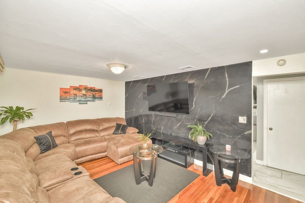 Interior, Living room, Marble Walls, Recessed Lighting, Wood Texture Flooring