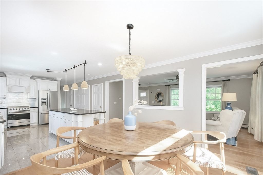 Chandelier, Dining room, Interior, Kitchen, Pendant Lights, Stainless Steel Appliances, Wood Texture Flooring