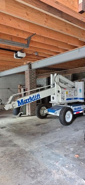 Garage, Interior, Stone Walls, Wooden Beams